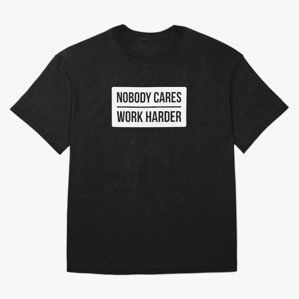 Nobody Cares Work Harder (White Rectangle Design) Oversized T-Shirt Stand Out with Spirit from the FIFA World Cup 2026 Journey through Mbappe Highlights, Argentina Pride, Worldwide Fan Energy, Dramatic Goals, Stadium Lights and Championship